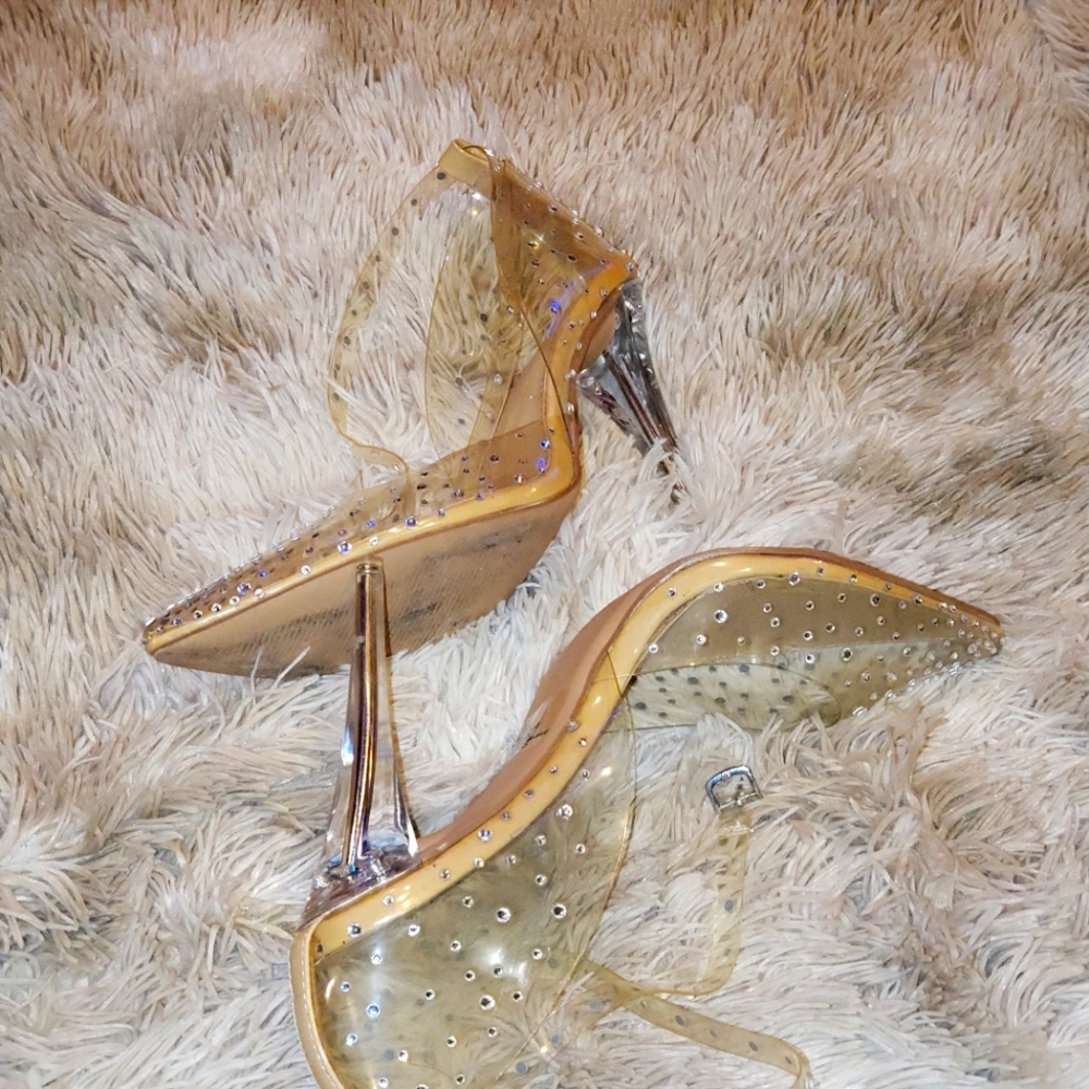 Shoe Dazzle clear with an ankle strap size 11